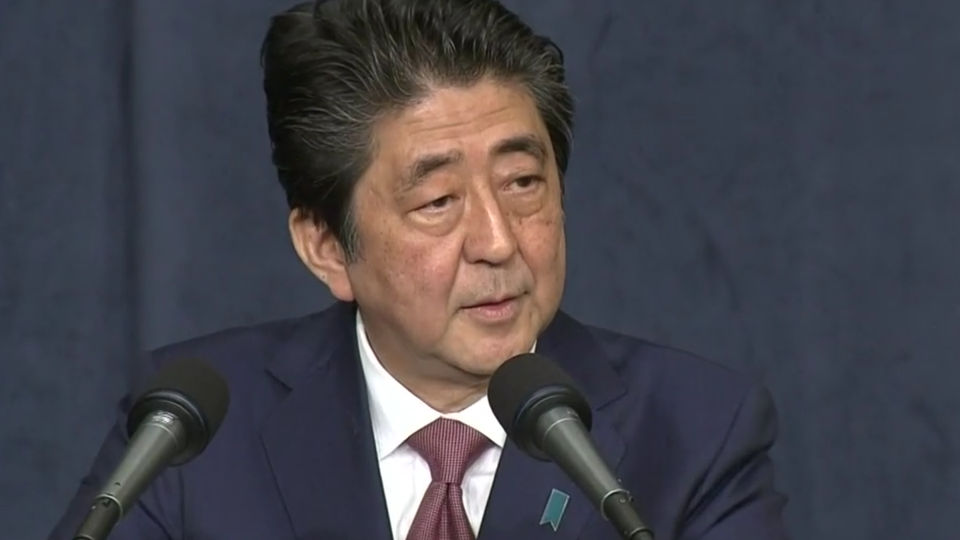 PM Abe at podium
